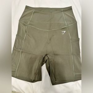 Gymshark pocket shorts, size small, dusty olive.